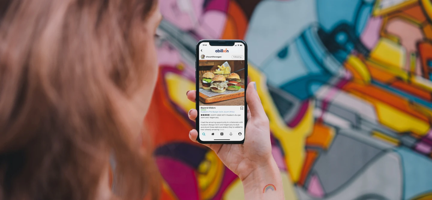 A-courier-and-a-customer-showing-a-grocery-order-delivery